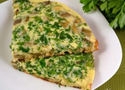 Omelet with green onions in butter Eggs stuffed with cod liver and green onions